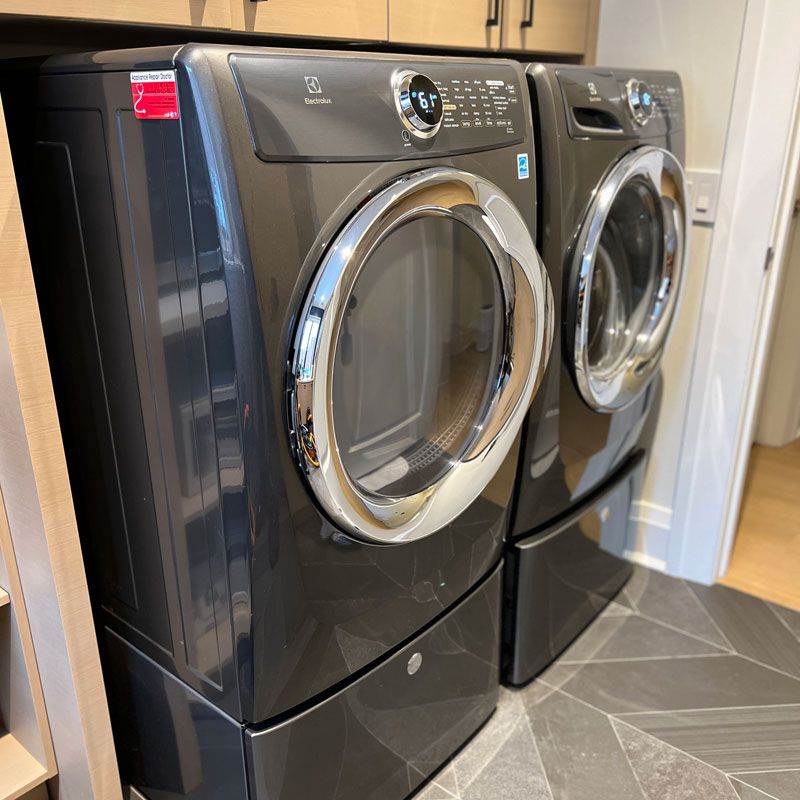 Electrolux front-load washer and dryer set in laundry room, Chicago & Suburbs, IL